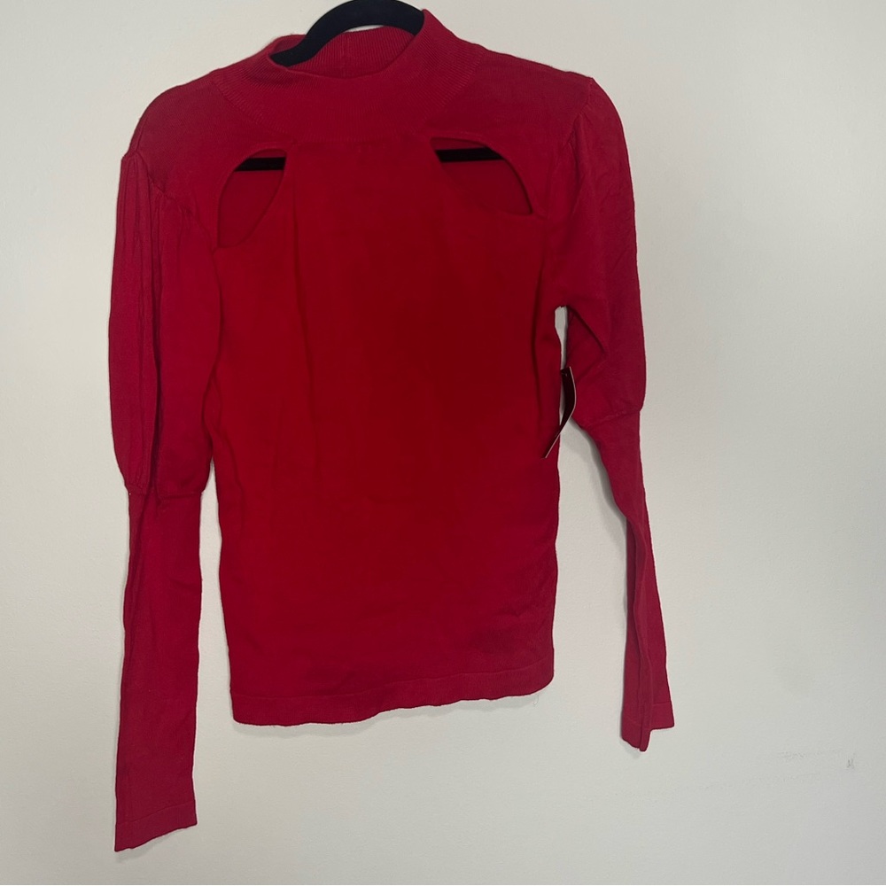13. Nikkak: Red Sweater with Cut Outs